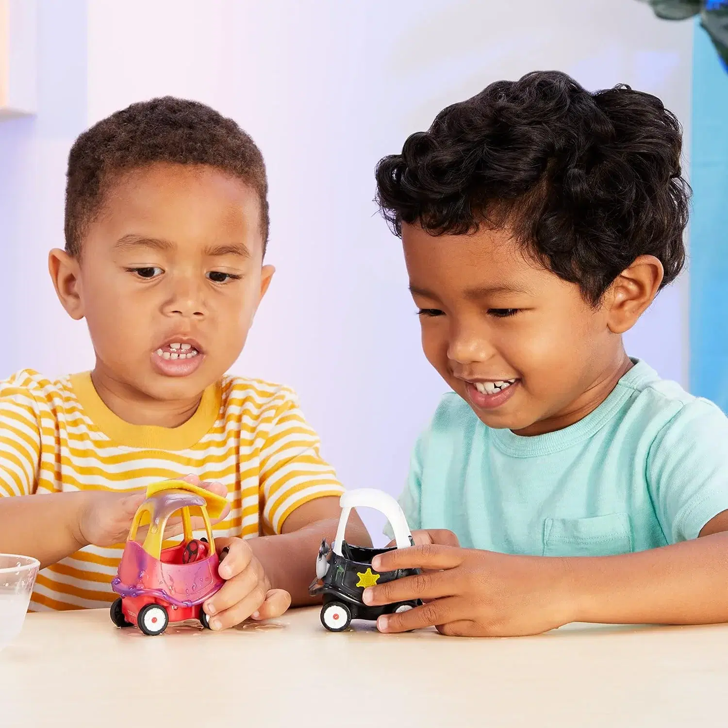Little Tikes Let's Go Cozy Coupe Color Change Vehicles 2-Pack (Ages 3+) Little Tikes Let's Go Cozy Coupe Color Change Vehicles 2-Pack (Ages 3+) - toy product image